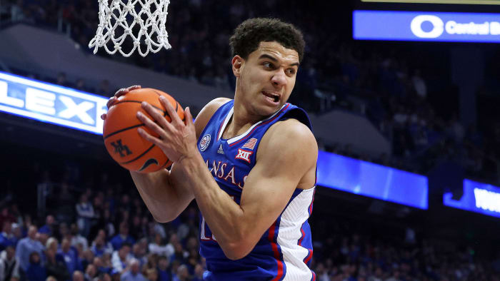 Kansas’s Kevin McCullar Jr. pulls down a rebound